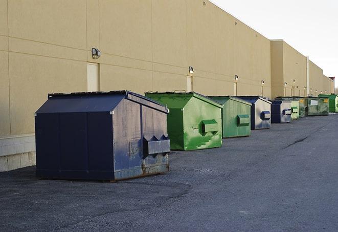 a row of construction dumpsters parked on a jobsite in Tumwater WA